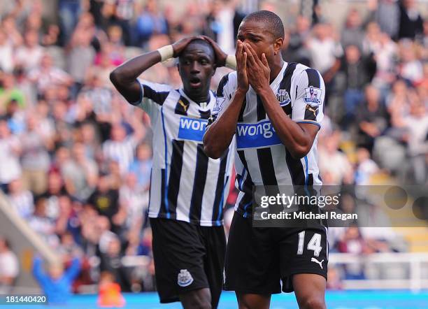 Moussa Sissoko and Loic Remy of Newcastle look dejected during the Barclays Premier League match between Newcastle United and Hull City at St James'...