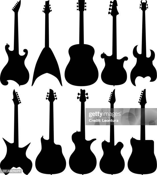 guitar silhouettes - heavy metal electric guitars stock illustrations