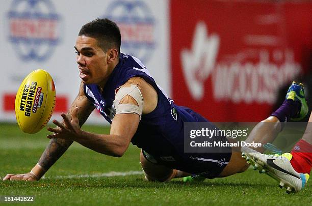 Michael Walters of the Dockers reaches for the ball during the AFL Second Preliminary Final match between the Fremantle Dockers and the Sydney Swans...