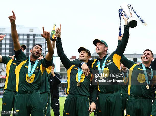 Ajmal Shahzad,Chris Read, Graeme Swann and Steven Mullaney of Nottinghamshire celebrates with the trophy after the Yorkshire Bank 40 Final match...