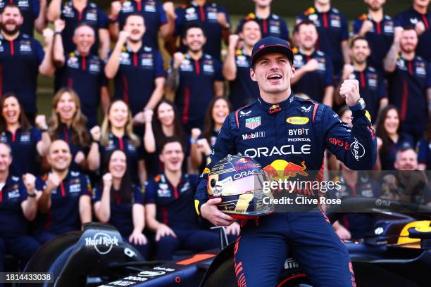 Max Verstappen of the Netherlands and Oracle Red Bull Racing poses at the Red Bull Racing Team Photo prior to the F1 Grand Prix of Abu Dhabi at Yas...