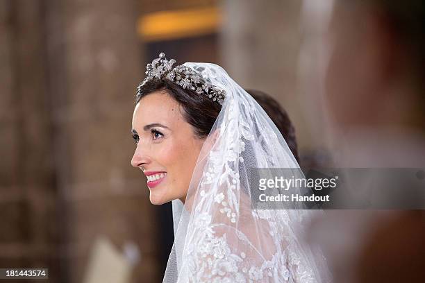 In this handout image provided by the Grand-Ducal Court of Luxembourg, Princess Claire Of Luxembourg is seen during her wedding ceremony to Prince...