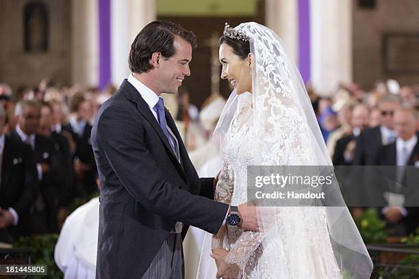 In this handout image provided by the Grand-Ducal Court of Luxembourg, Princess Claire Of Luxembourg and Prince Felix Of Luxembourg are seen during...