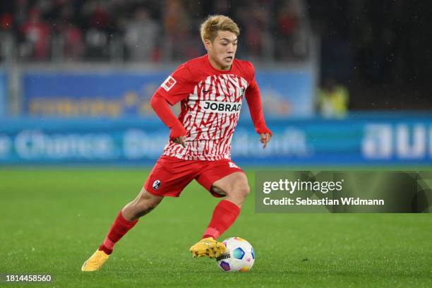 Ritsu Doan of SC Freiburg plays the ball during the Bundesliga match between Sport-Club Freiburg and SV Darmstadt 98 at Europa-Park Stadion on...