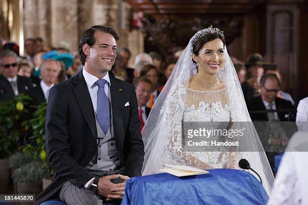 In this handout image provided by the Grand-Ducal Court of Luxembourg, Princess Claire Of Luxembourg and Prince Felix Of Luxembourg are seen during...