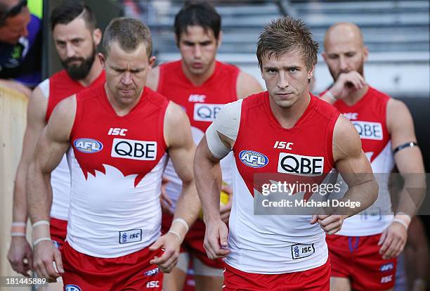 Kieran Jack of the Swans leads the team out during the AFL Second Preliminary Final match between the Fremantle Dockers and the Sydney Swans at...