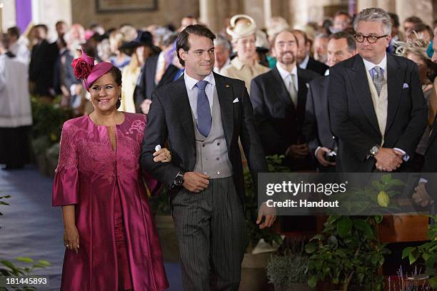 In this handout image provided by the Grand-Ducal Court of Luxembourg, Grand Duchess Maria Teresa and Prince Felix Of Luxembourg arrive to the...