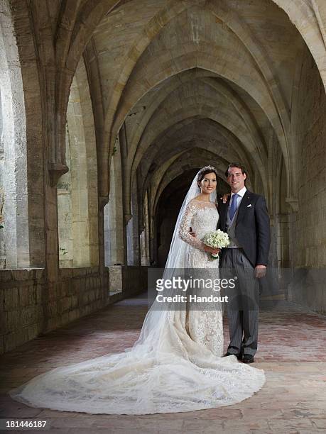 In this handout image provided by the Grand-Ducal Court of Luxembourg, Princess Claire Of Luxembourg and Prince Felix Of Luxembourg pose for an...