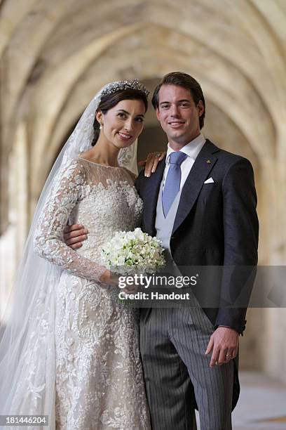 In this handout image provided by the Grand-Ducal Court of Luxembourg, Princess Claire Of Luxembourg and Prince Felix Of Luxembourg pose for an...