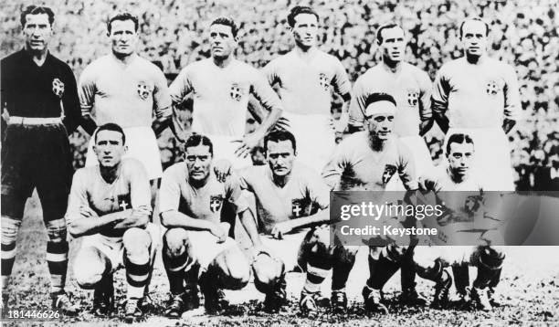 The Italian National Football Team line up before a game during the 1934 FIFA World Cup, Italy, 1934. Standing L - R; Gianpiero Combi , Luis Monti ,...