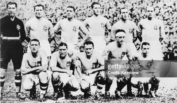 The Italian National Football Team line up before a game during the 1934 FIFA World Cup, Italy, 1934. Standing L - R; Gianpiero Combi , Luis Monti ,...