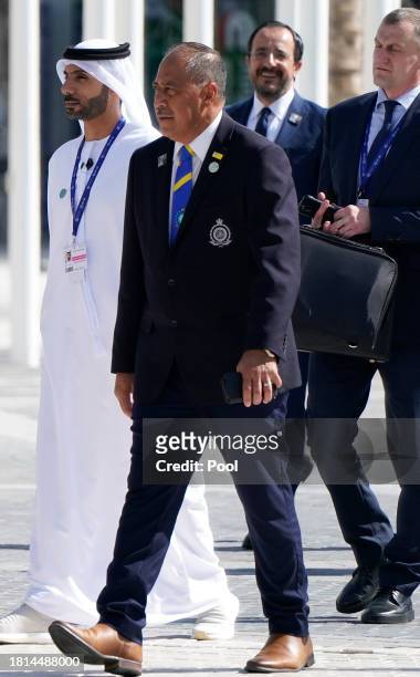 Niuean President Dalton Tagelagi walks with leaders to the World Climate Action Summit during COP28 on December 1, 2023 in Dubai, United Arab...