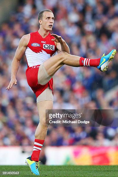 Ted Richards of the Swans kicks the ball during the AFL Second Preliminary Final match between the Fremantle Dockers and the Sydney Swans at...