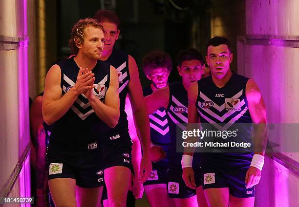 David Mundy and Ryan Crowley of the Dockers walk onto the ground during the AFL Second Preliminary Final match between the Fremantle Dockers and the...