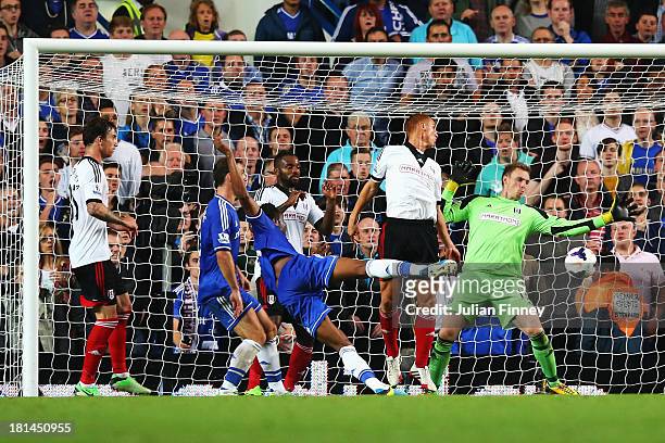 Jon Obi Mikel of Chelsea scores his sides second goal during the Barclays Premier League match between Chelsea and Fulham at Stamford Bridge on...