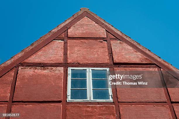 gable of a half timbered house - fachwerk stock-fotos und bilder
