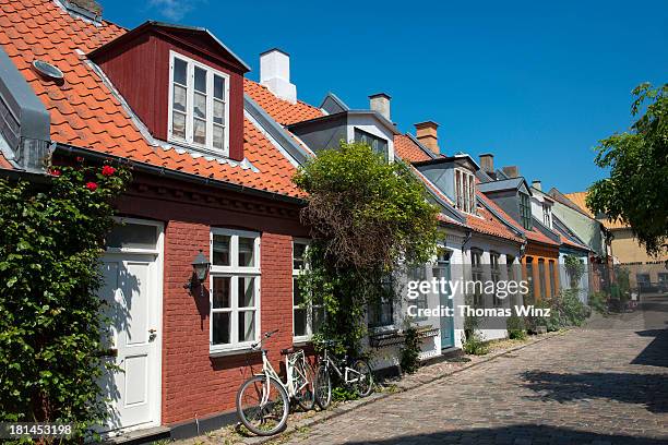 old buildings on " mollestien " lane in aarhus - jutland stockfoto's en -beelden