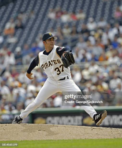 Pitcher Nelson Figueroa of the Pittsburgh Pirates pitches against the Chicago Cubs during a game at PNC Park on September 21, 2003 in Pittsburgh,...