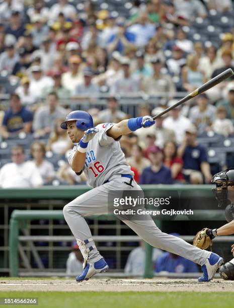 Aramis Ramirez of the Chicago Cubs bats against the Pittsburgh Pirates as catcher Jason Kendall of the Pirates looks on during a game at PNC Park on...