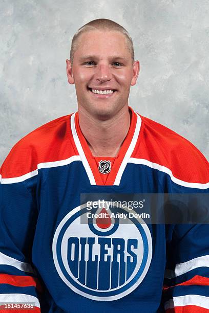 Ben Eager of the Edmonton Oilers poses for his official headshot for the 2013-2014 NHL season on September 11, 2013 in Edmonton, Alberta, Canada.
