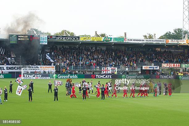 Opkomst spelers during the Eredivisie match between Heracles Almelo and FC Twente on September 21, 2013 at the Polman stadium at Almelo, The...