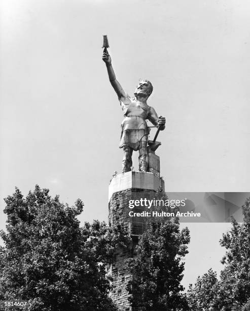 Vulcan Statue, Birmingham, Alabama, c. 1930. The statue portrays Vulcan, the Roman god of fire, and is the world's largest cast metal statue.