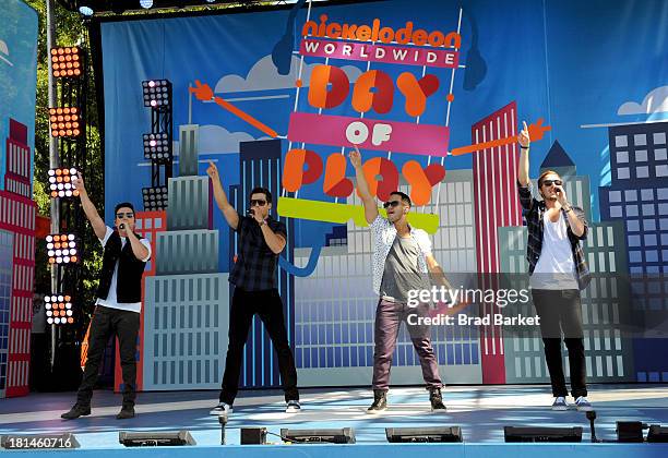 Music sensation Big Time Rush takes the stage at Nickelodeons 10th Annual Worldwide Day of Play in Brooklyns Prospect Park on September 21, 2013 in...