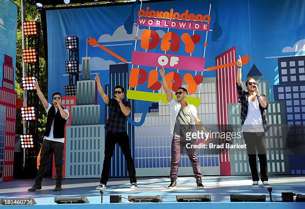 Music sensation Big Time Rush takes the stage at Nickelodeons 10th Annual Worldwide Day of Play in Brooklyns Prospect Park on September 21, 2013 in...
