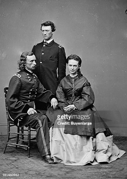 George Armstrong Custer , his wife, Libbie Custer, and his brother Tom Custer, circa 1863. George and Tom Custer both died at the Battle of Little...