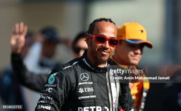 Lewis Hamilton of Great Britain and Mercedes AMG Petronas F1 Team W1 walks in the Paddock prior to the F1 Grand Prix of Abu Dhabi at Yas Marina...