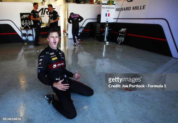 Formula 2 Champion Theo Pourchaire of France and ART Grand Prix and the ART Grand Prix team celebrate after the Round 14 Yas Marina Feature race of...