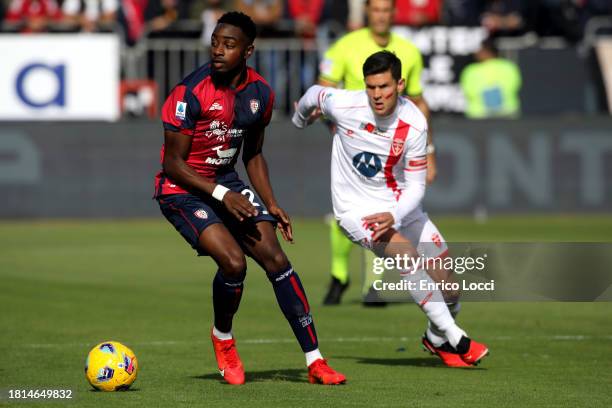 Antonine Makoumbou of Cagliari in contrast during the Serie A TIM match between Cagliari Calcio and AC Monza at Sardegna Arena on November 26, 2023...