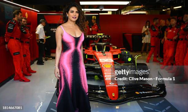 Priyanka Chopra poses for a photo in the Ferrari garage prior to the F1 Grand Prix of Abu Dhabi at Yas Marina Circuit on November 26, 2023 in Abu...
