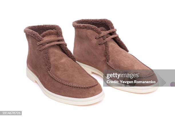 suede shoes with fur isolated on white background - botas de ante fotografías e imágenes de stock