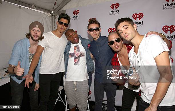Jay McGuiness, Siva Kaneswaran, Nathan Sykes, Max George and Tom Parker of The Wanted pose with radio personality Maxwell during the iHeartRadio...