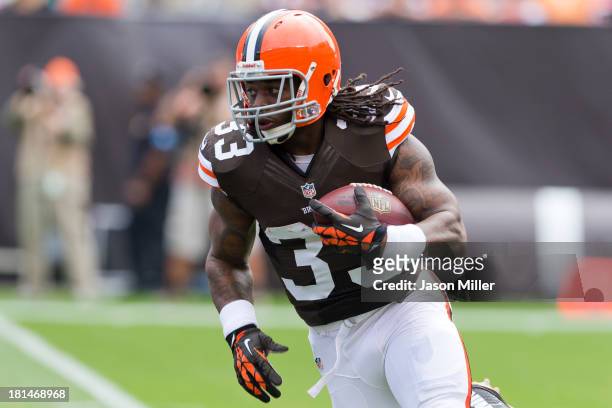 Running back Trent Richardson of the Cleveland Browns runs a play during the first half against the Miami Dolphins at First Energy Stadium on...