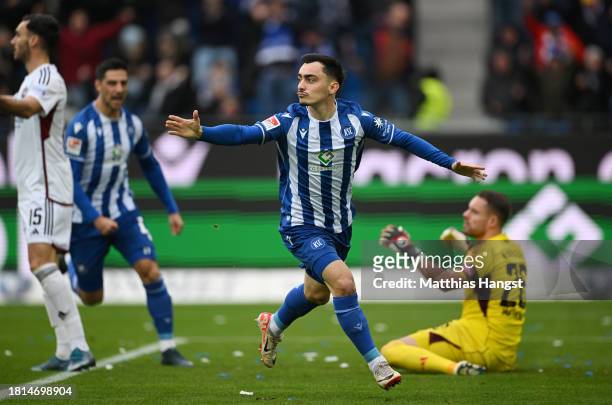 Paul Nebel of Karlsruher SC celebrates after scoring the team's first goal during the Second Bundesliga match between Karlsruher SC and 1. FC...