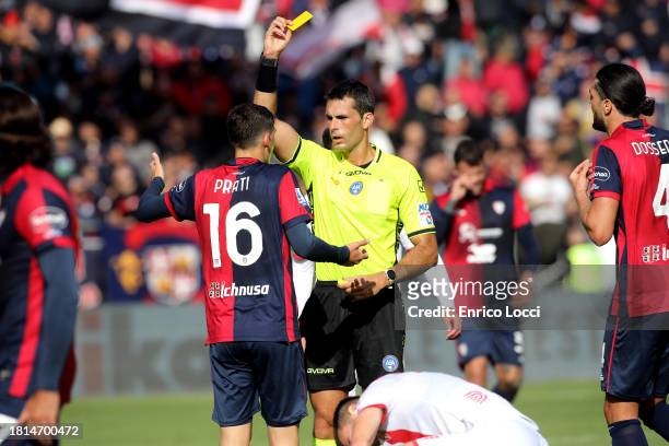 Admonition of Matteo Prati of Cagliari receives a yellow card during the Serie A TIM match between Cagliari Calcio and AC Monza at Sardegna Arena on...