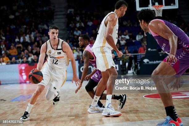 Carlos Alocen and Edy Tavares of Real Madrid in action during ACB League match between Real Madrid and Morabanc Andorra at WiZink Center on November...