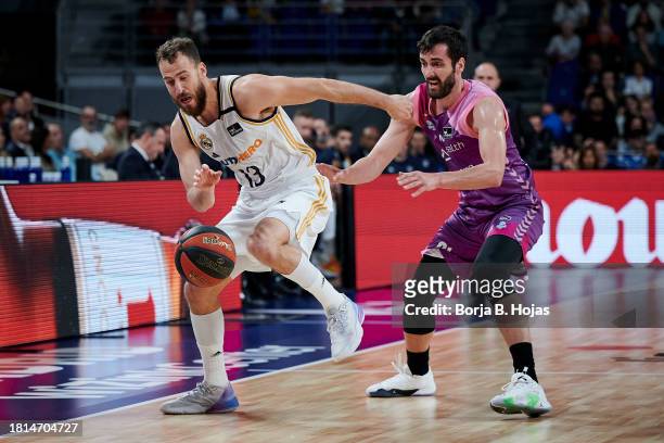 Sergio Rodriguez of Real Madrid and Tobias Borg of Morabanc Andorra in action during ACB League match between Real Madrid and Morabanc Andorra at...