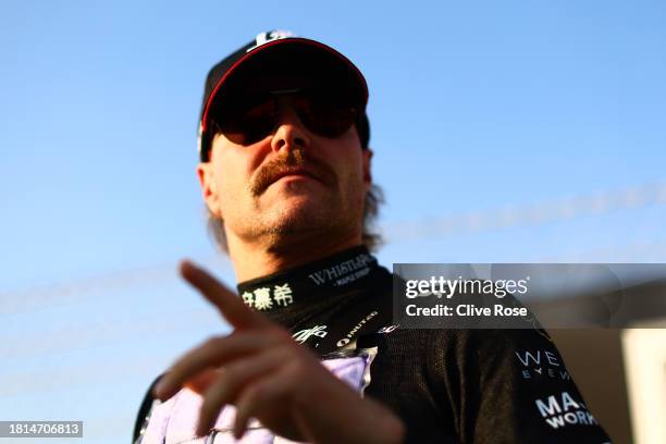 Valtteri Bottas of Finland and Alfa Romeo F1 prepares to drive on the grid prior to the F1 Grand Prix of Abu Dhabi at Yas Marina Circuit on November...