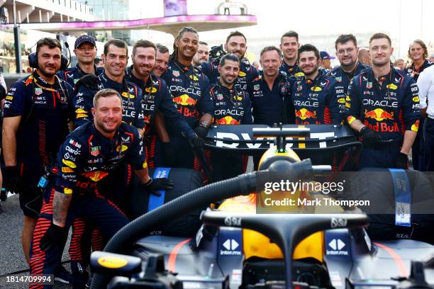 Red Bull Racing Team Principal Christian Horner poses for a photo with the Red Bull Racing team on the grid prior to the F1 Grand Prix of Abu Dhabi...