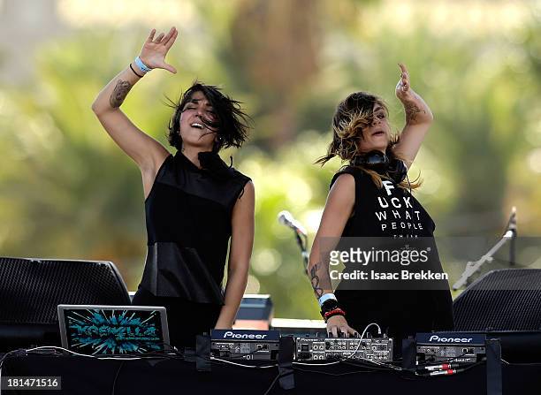 Yasmine Yousaf and Jahan Yousaf of Krewella perform onstage during the iHeartRadio Music Festival Village on September 21, 2013 in Las Vegas, Nevada.