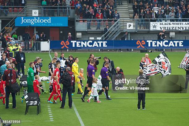 Opkomst spelers during the Eredivisie match between Heracles Almelo and FC Twente on September 21, 2013 at the Polman stadium at Almelo, The...