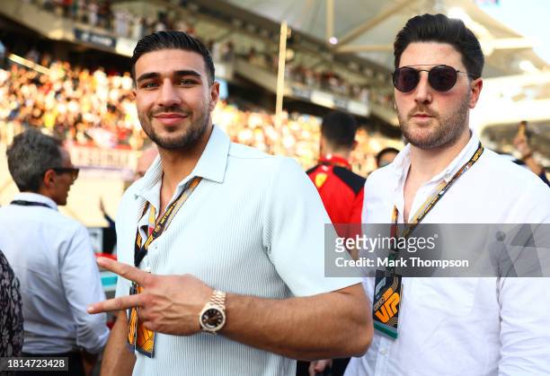 Tommy Fury poses for a photo on the grid prior to the F1 Grand Prix of Abu Dhabi at Yas Marina Circuit on November 26, 2023 in Abu Dhabi, United Arab...