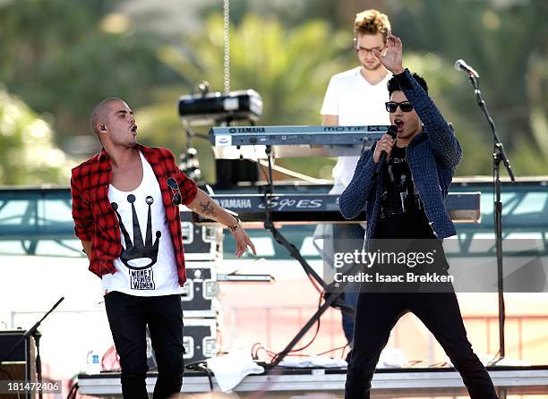 Max George and Siva Kaneswaran of The Wanted perform onstage during the iHeartRadio Music Festival Village on September 21, 2013 in Las Vegas, Nevada.