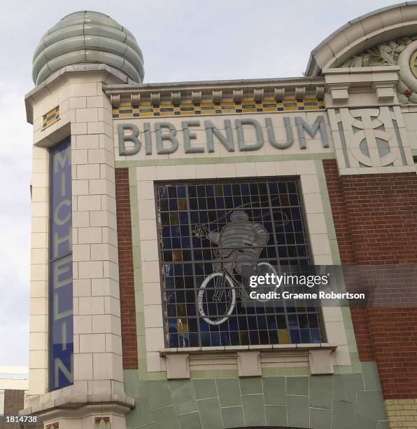 The Michelin Man logo is shown on the front of the Michelin headquarters February 25, 2003 in London. The French tire maker announced that its net...