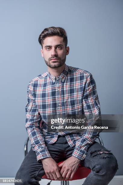 handsome young man studio shot - plaid shirt isolated stock pictures, royalty-free photos & images