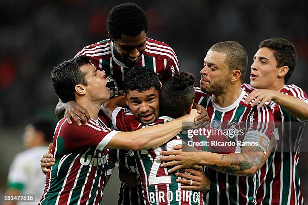 Players of Fluminense celebrate a scored goal during the match between Fluminense and Coritiba for the Brazilian Series A 2013 at Maracana on...