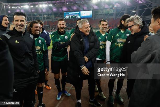The former Italian football player Roberto Baggio celebrate with player after the 2023 World Super-footballer Games between American Star Team and...